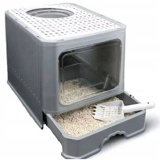 Stor sammenleggbar kattedo i grå plast med gjennomsiktig frontluke, uttrekkbar sandbakke og hvit spade, sett skrått forfra.