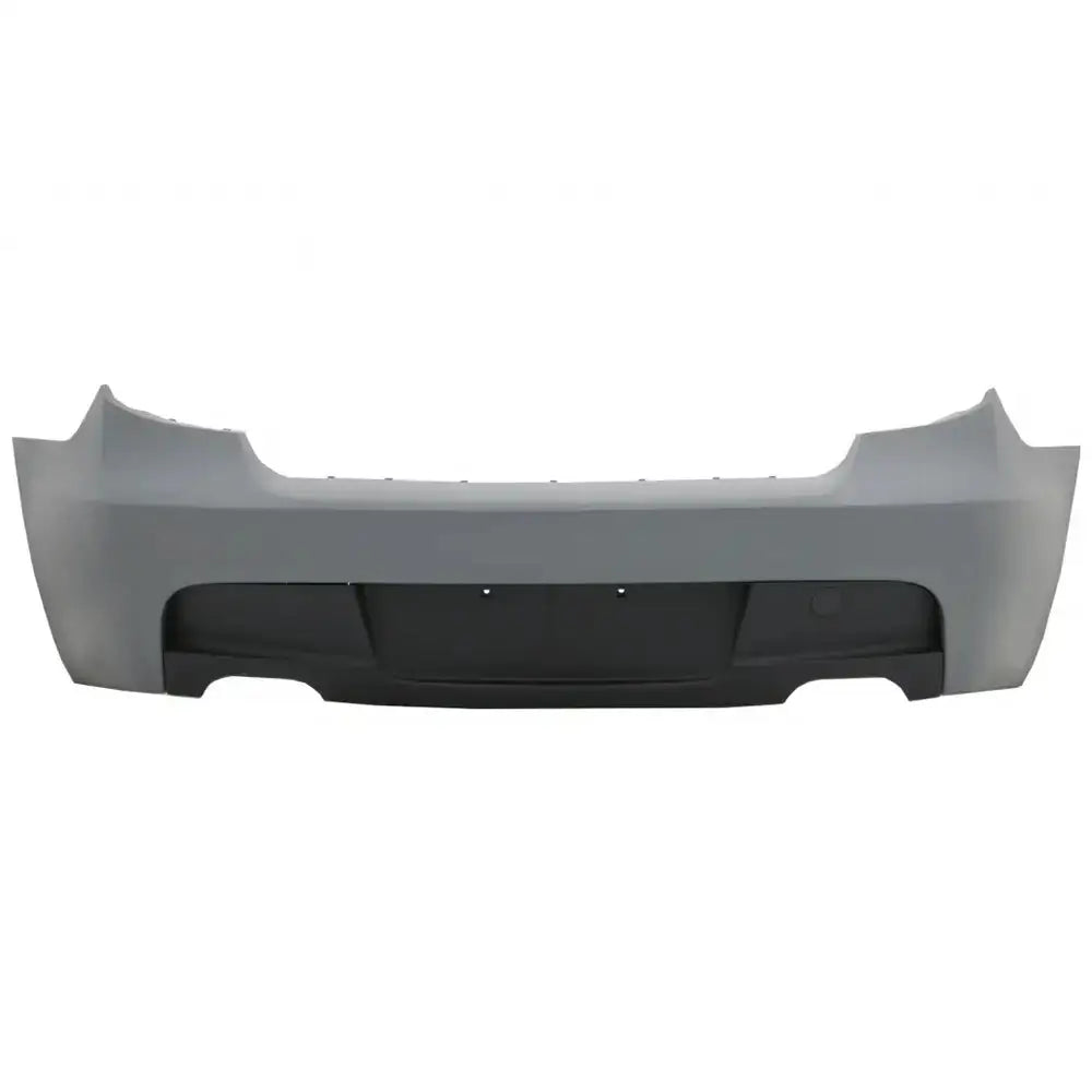 Støtfanger bak til BMW 1 Serie E81 04-07 i grå plast med sort nedre seksjon og markerte linjer.