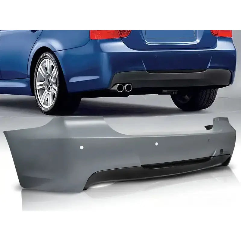 Støtfanger bak til BMW E90 M-Pack PDC i matt grå plast med svart nedre del og eksosutskjæring.