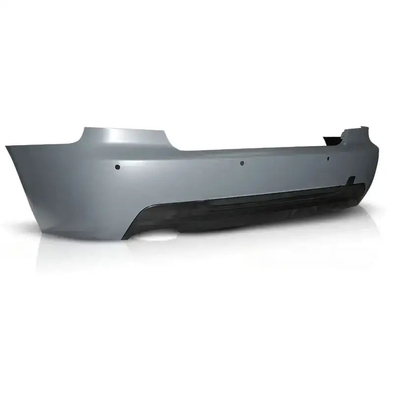 Bakfanger Bmw E92 06-13 M-Pack PDC i grå plast med sort nedre seksjon og synlige monteringshull.