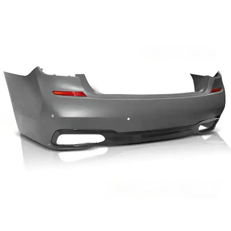 Bakfanger Bmw G11/G12 15-18 M-Tech Style PDC i grå plast med røde refleks og eksosåpninger.