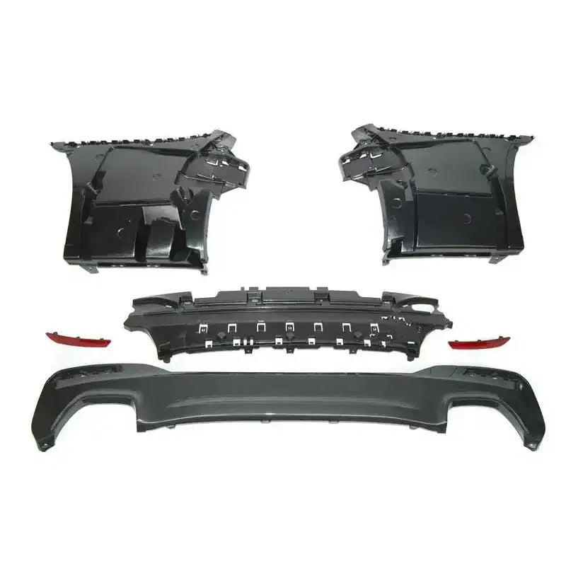 Bakre bumper BMW G30 17- M-Tech Style PDC, sett med fem svarte og røde plastdeler, vist ovenfra.