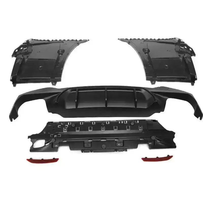 Bakstøtfanger BMW G30 17- M5 Style PDC med sorte plastdeler og røde detaljer vist fra oversiden.