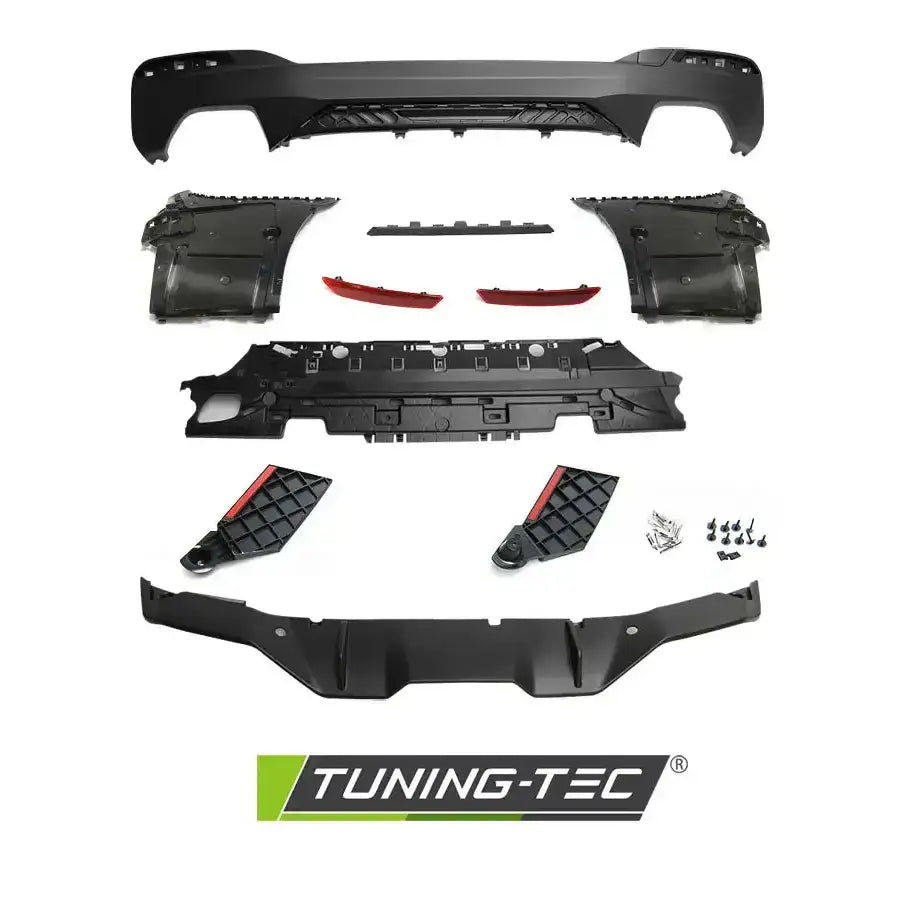 Bakre støtfanger BMW G31 17- M-Performance Style med sorte plastdeler, skruer og tilbehør sett ovenfra.