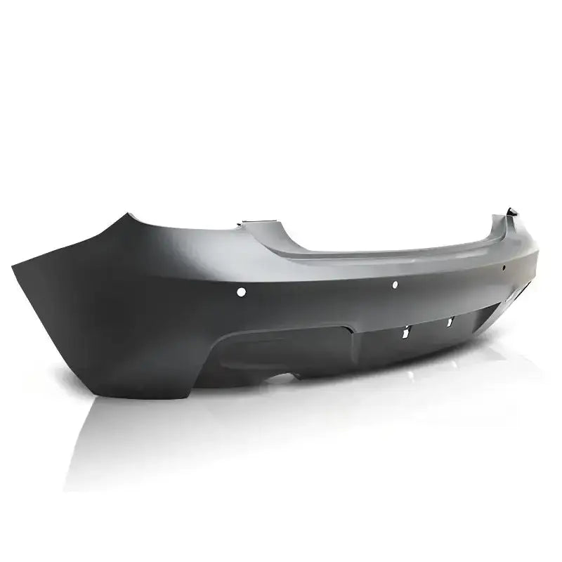 Bakfanger F20/F21 M-Tech Style svart plast med monteringshull sett fra skrå vinkel mot hvit bakgrunn.