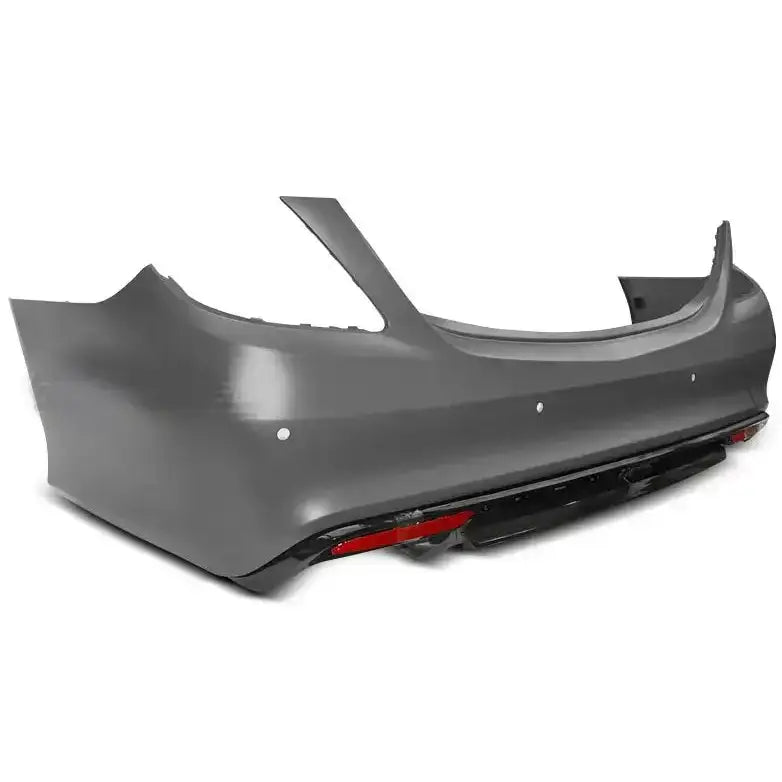 Støtfanger bak Mercedes S-Klasse W222 AMG S63 grå plast med sensorhull og refleks på hvit bakgrunn.