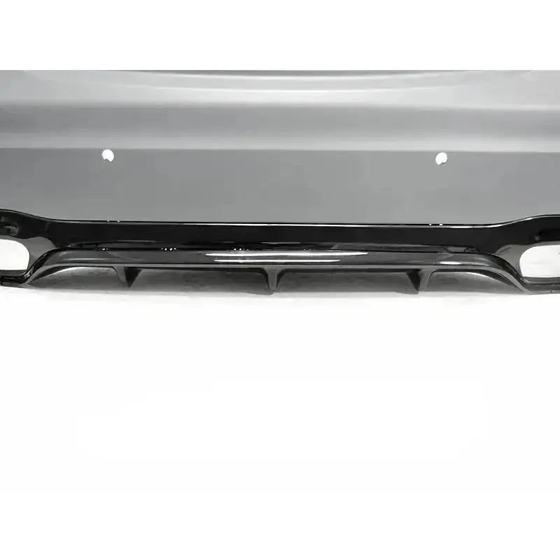 Bakre støtfanger Mercedes W213 E63 AMG Style sort med aerodynamiske finner og blank overflate.