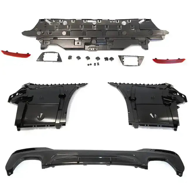 Bakre støtfanger Sport Style PDC til BMW G30 LCI med sorte plastdeler, røde reflektorer og tilbehør.