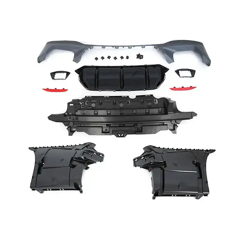 Bakre støtfanger Sport Style PDC til BMW G30 LCI 20-, sett med sorte og grå plastdeler på hvit bakgrunn.