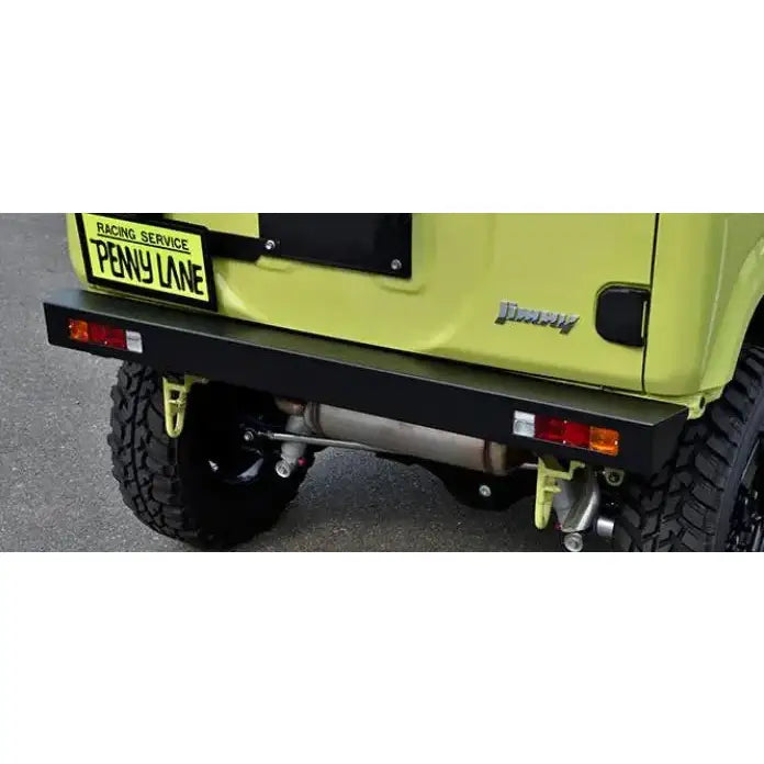 Bakfanger stål til Suzuki Jimny 18-, montert på lys grønn bil med synlige terrengdekk og baklykter.