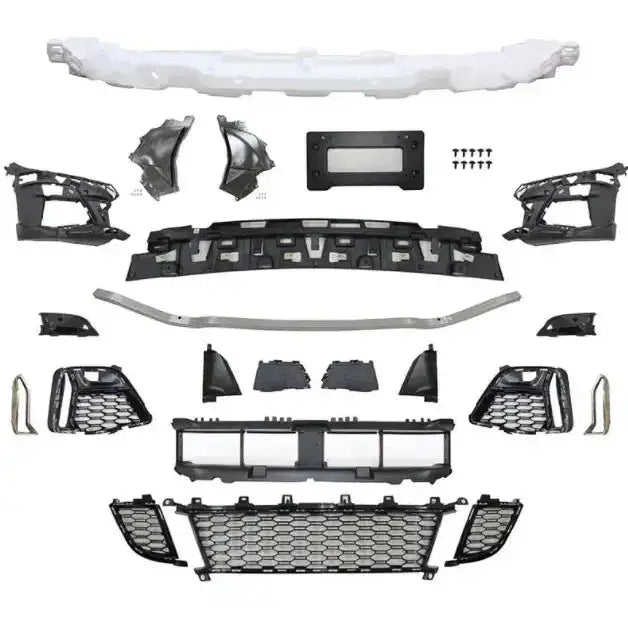 Front bumper 340 Look PDC til BMW G20/G21 sett ovenfra med grill, braketter og monteringsdeler.