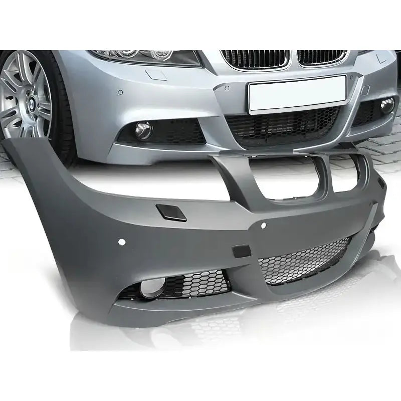 Støtfanger foran BMW E90/E91 09-11 M-Pack PDC i mattgrå plast med sorte luftinntak og tåkelyktåpning.