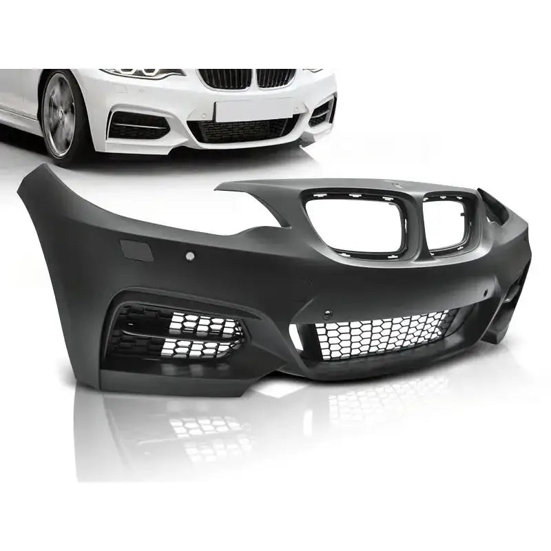 Støtfanger foran til BMW F22/F23 M235 med PDC, sort plast med store luftinntak, sett skrått forfra.