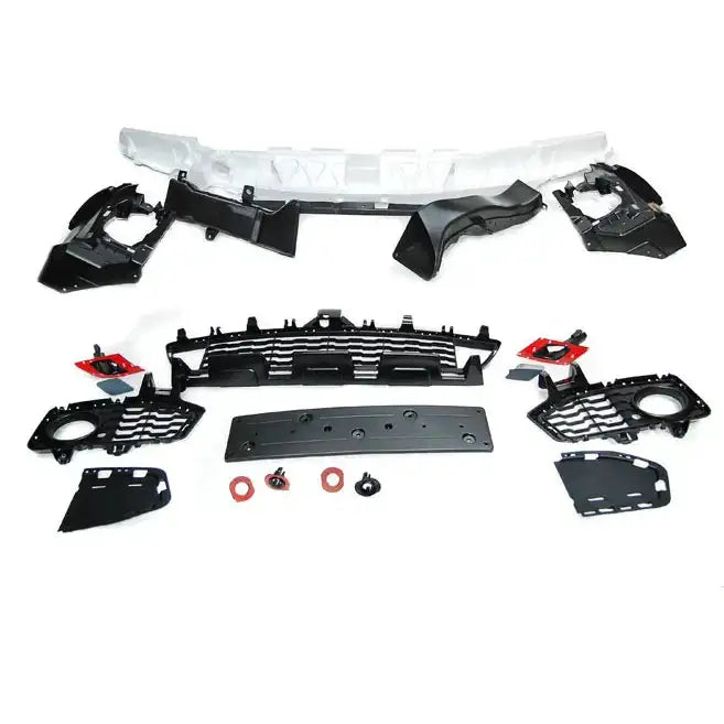 Frontfanger BMW F32/F33/F36 M-Tech Style PDC med sorte og røde plastdeler, skruer og pakninger.