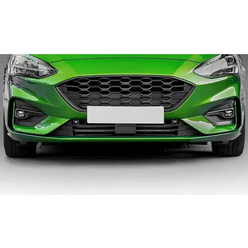 Frontfanger til Ford Focus 18-21 Sport STL, grønn bil med sort grill og markante frontlykter.