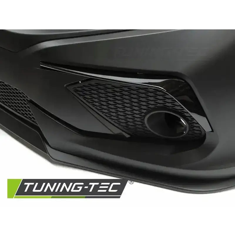 Frontbumper Honda Civic X 16-18 Sedan CONCEPT Style med integrert luftinntak og rund åpning, sett skrått.
