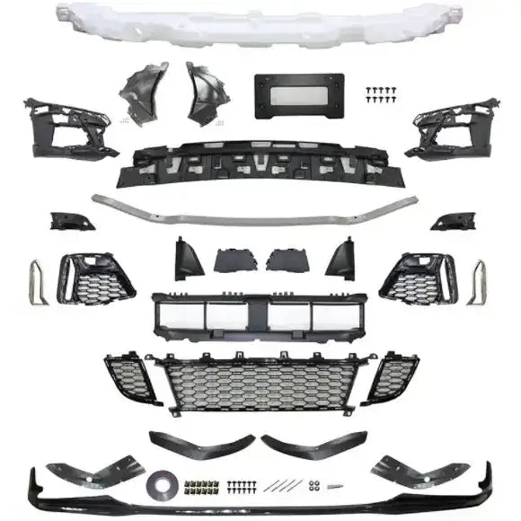 Front bumper Performance PDC Carbon Look komplett sett til BMW G20/G21, sett ovenfra mot hvit bakgrunn.