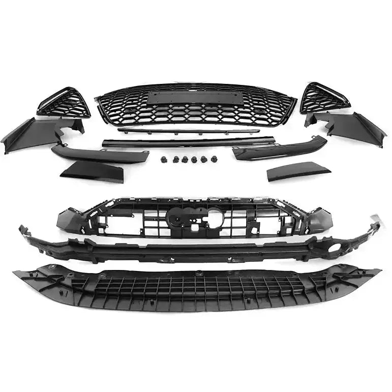 Front bumper til Audi A6 C8 Sport PDC 18-22, flere svarte bildeler med grill og deksler på hvit bakgrunn.