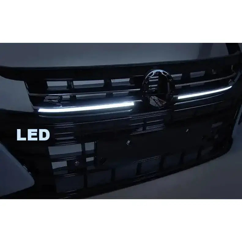 Frontfanger til Volkswagen Arteon 17- med integrert LED-lyslist, sett forfra i mørkt miljø.