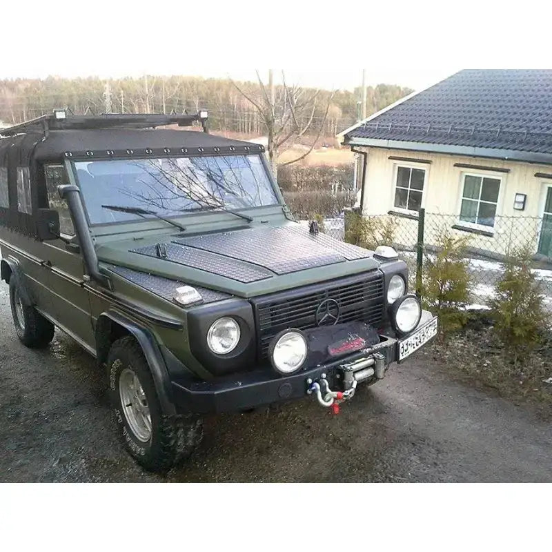 Frontbumper stål til Mercedes Gelandewagen, med vinsj, ekstra lykter og robuste offroad-dekk.
