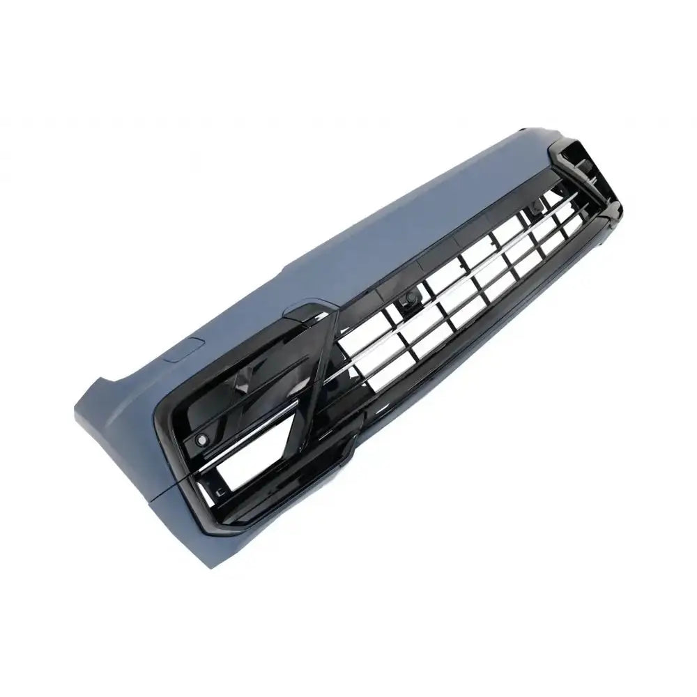 Front bumper til Volkswagen Tiguan 15-, svart og grå plast med tydelige rutenett og markerte kanter.