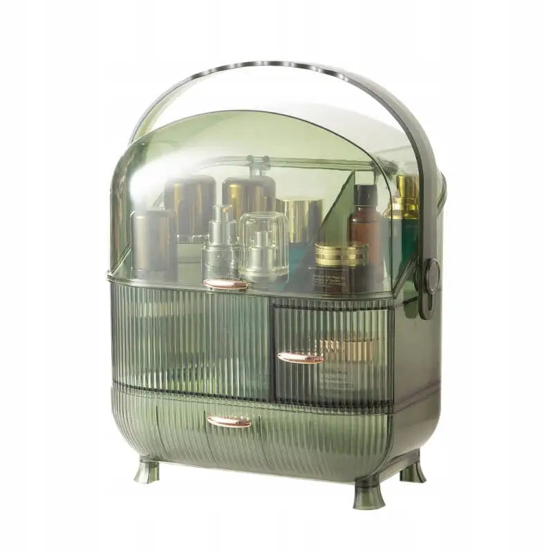 Strado smykkeskrin organizer i gjennomsiktig grønn plast, frontvisning med flasker, krukker og metallhåndtak.