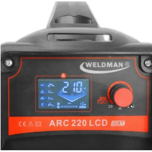 Sveiseapparat Arc 220, nærbilde av frontpanel med blå LCD-skjerm, rød justeringsknapp og tydelige symboler.