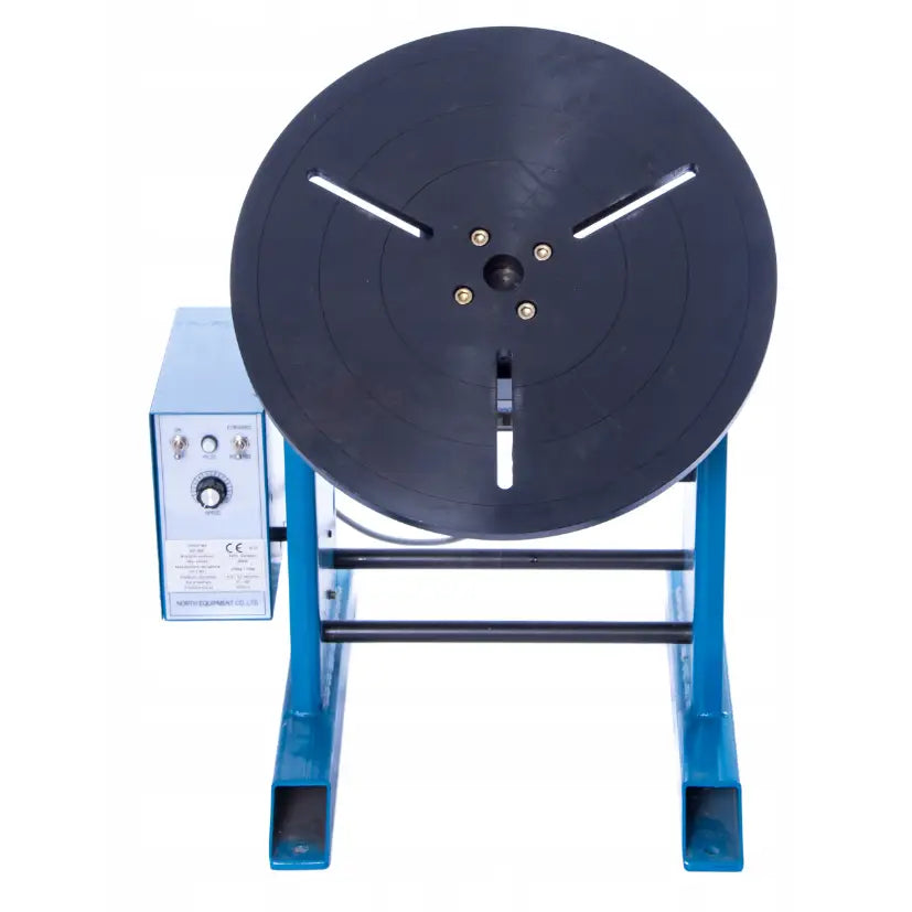 Sveisebord med dreiefunksjon Magnum, frontvisning av svart metallplate og synlig blå justeringspanel til venstre.