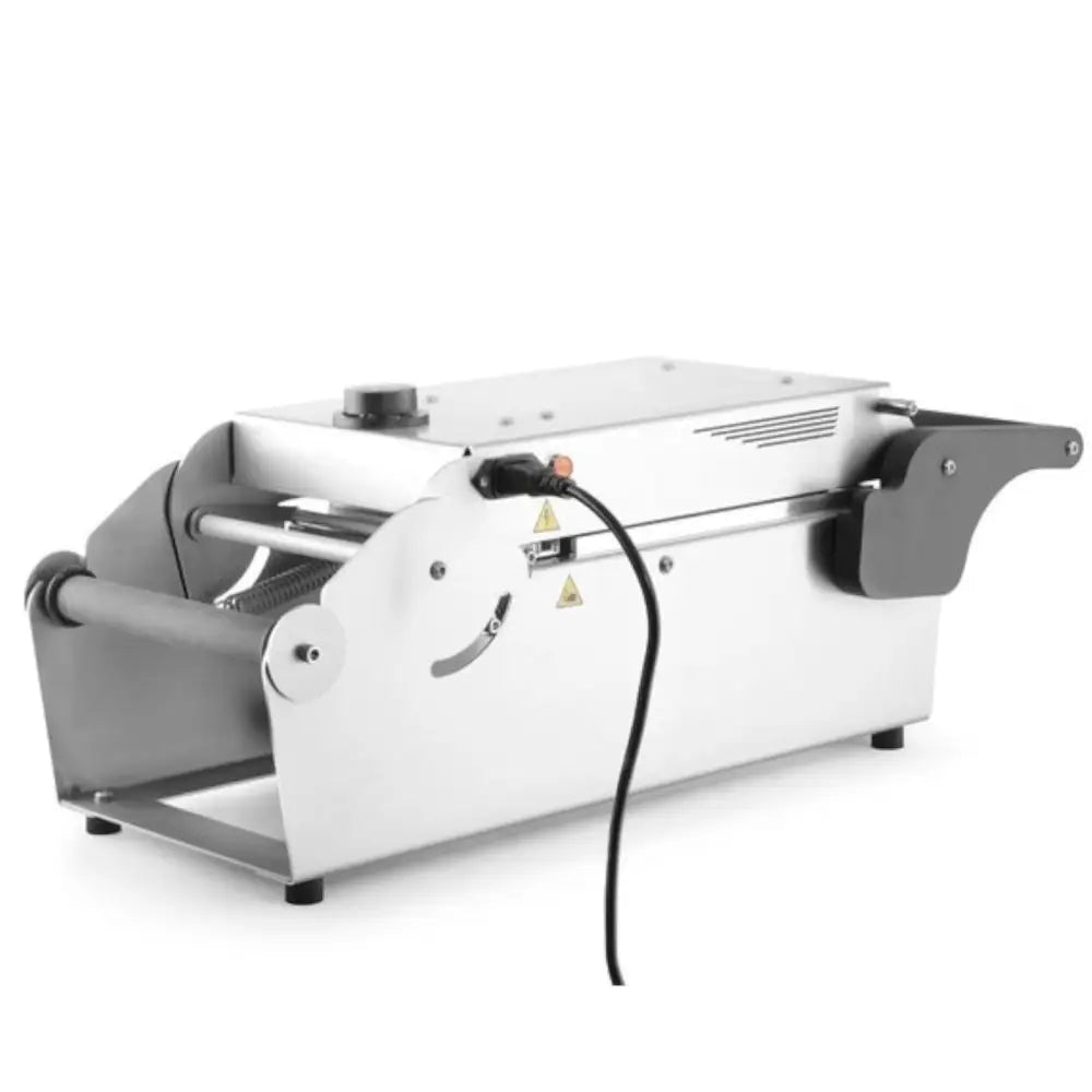 Sveisemaskin for takeaway matbeholdere, bakside med synlig strømkabel og varseltrekant på stålkabinettet.