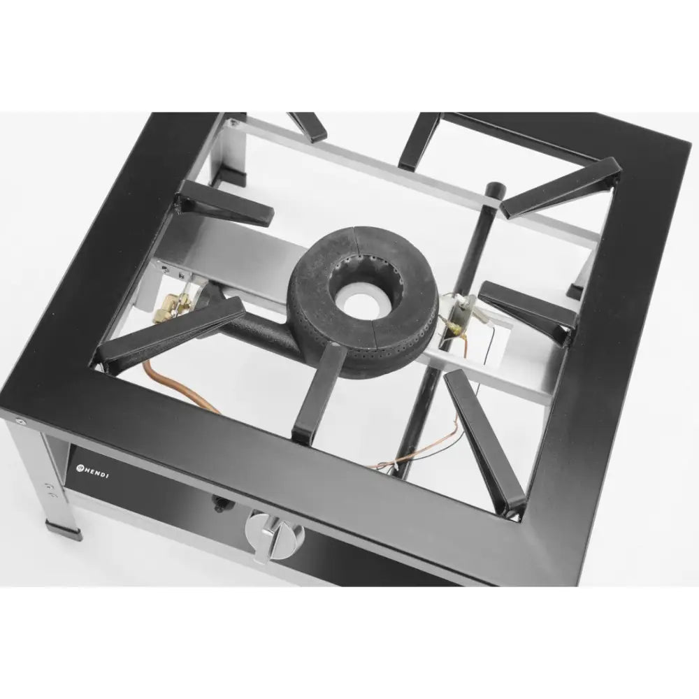 Taburett gassvarmer Kitchen Line, toppvisning som fremhever solide metallrister, kobberrør og frontens kontrollbrytere.