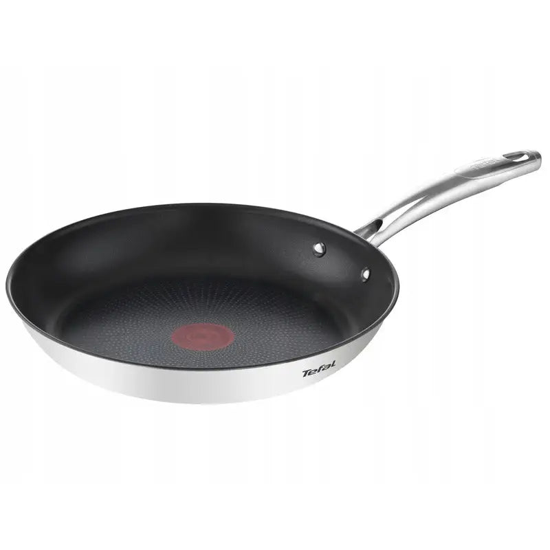 Tefal Duetto+ stekepanne 28 cm, skrå oversiktsvinkel med rød temperaturindikator og langt håndtak.