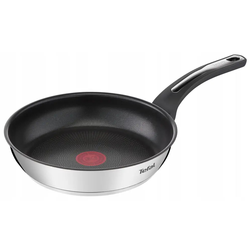 Tefal Emotion induksjonspanne 24cm, skråvisning som viser rød temperaturindikator og sort håndtak med metallinnlegg.
