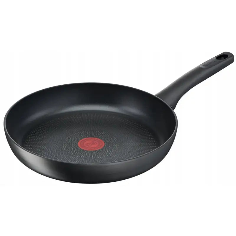 Tefal Ultimate 24 cm stekepanne med titan non-stick, skrått sett med rød Thermo-Spot og sort håndtak.