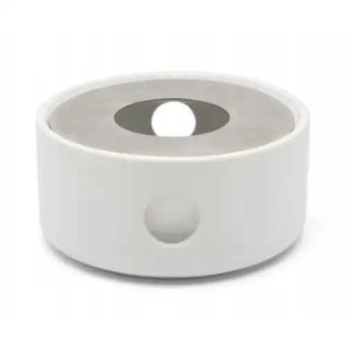 Tekanne Sett Umea 1,2 L, hvit keramikk sett skrått ovenfra med synlig lokkåpning og sidehull.