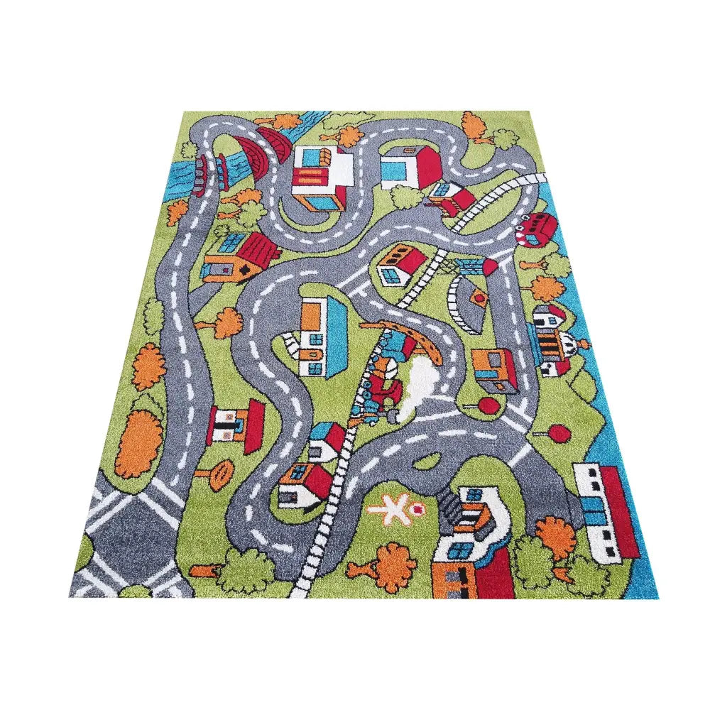 Tepe Bella teppe 160 x 220 cm med fargerikt motiv av veier, bygninger og trær sett fra skrått fugleperspektiv.