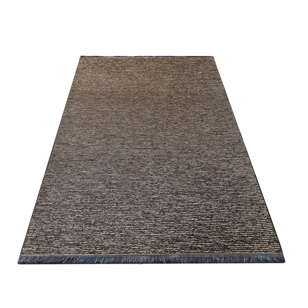 Tepe Diamond beige teppe 160 x 230 cm, skråvisning som fremhever tettvevd struktur og mørk kantmarkering.