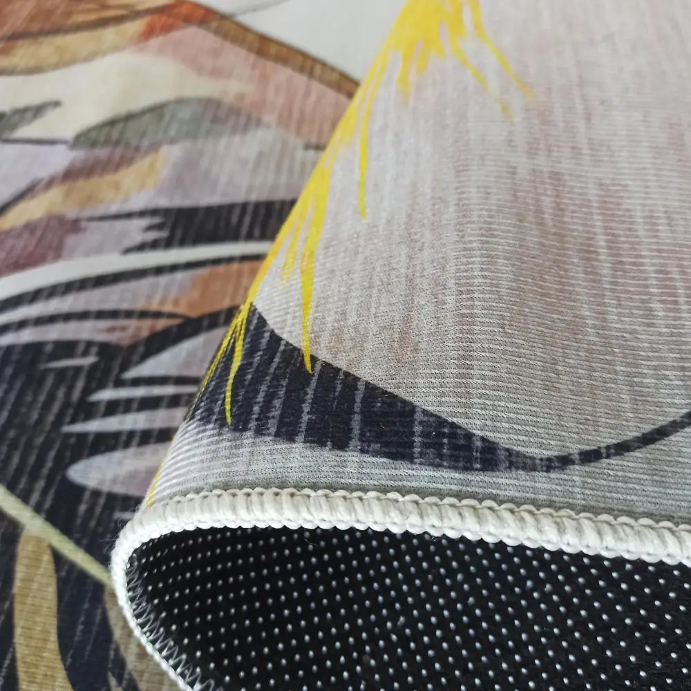 Tepe for Horeca-næringen, detaljert nærbilde av hjørne med mønster, hvit kant og sklisikker gummiprikkside.