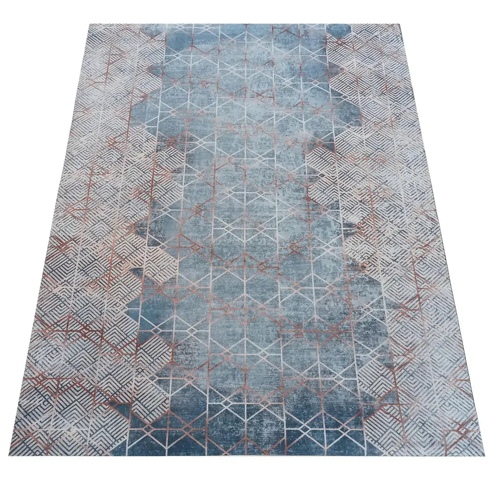 Tepe Horeca teppe, rektangulært med blått, hvitt og rust geometrisk mønster, sett ovenfra.