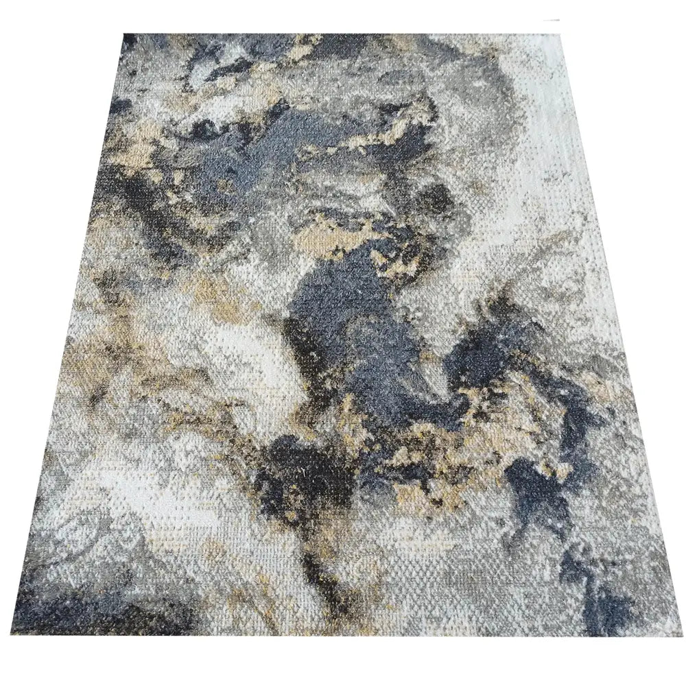 Tepe Lara-teppe 200 x 290 cm med abstrakt grått, svart og beige mønster, vevd tekstur sett skrått ovenfra.