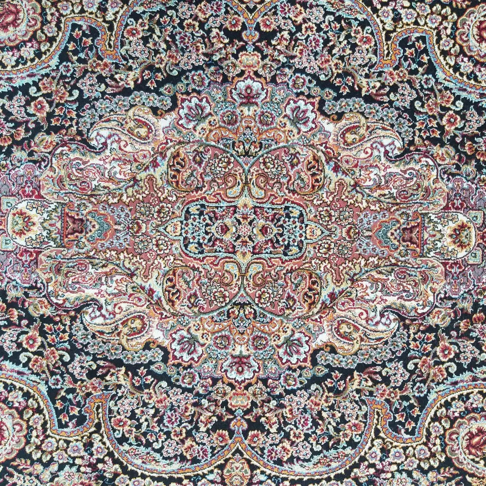 Tepe Luksuriøs Pers 06 Navy, nærbilde av midtpartiets orientalske mønster med røde og blå blomster.