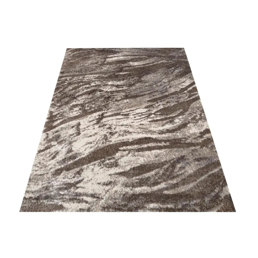 Tepe Moderne Panamero 13 teppe i brune og beige toner, sett skrått ovenfra med synlig teksturert overflate.
