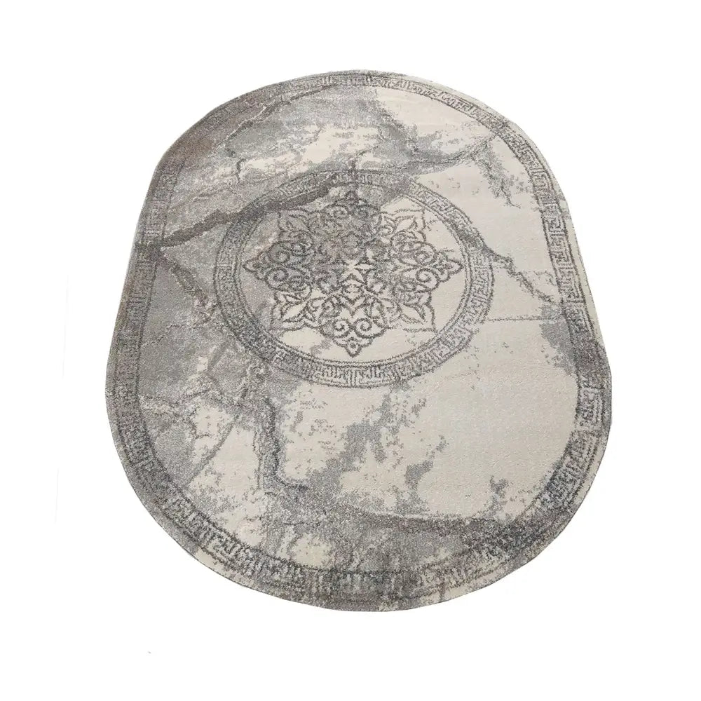 Tepe Moderne Vista 04 grått ovalt teppe med marmormønster og sirkeldekor, sett ovenfra mot hvit bakgrunn.