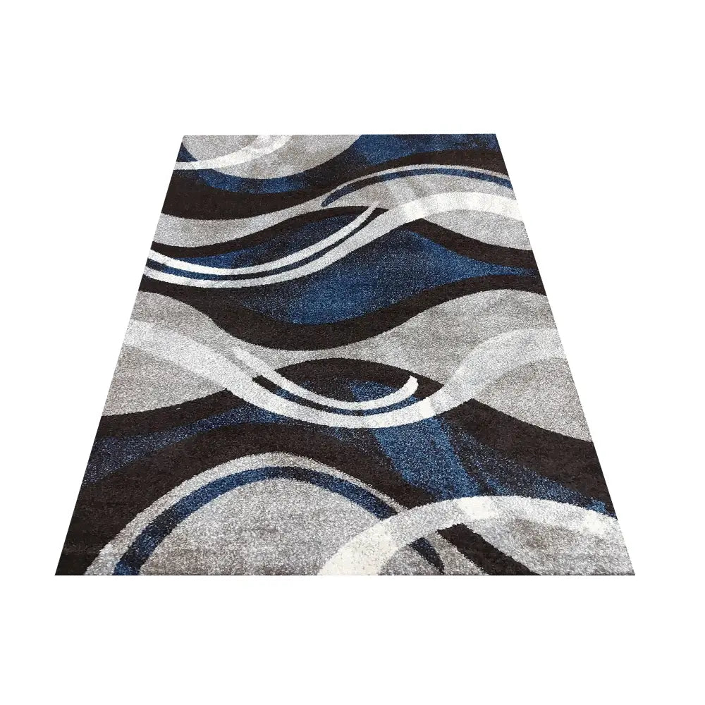 Tepe Otto 01 teppe 120 x 170 cm, bølgende mønster i blått, grått, svart og hvitt sett ovenfra.