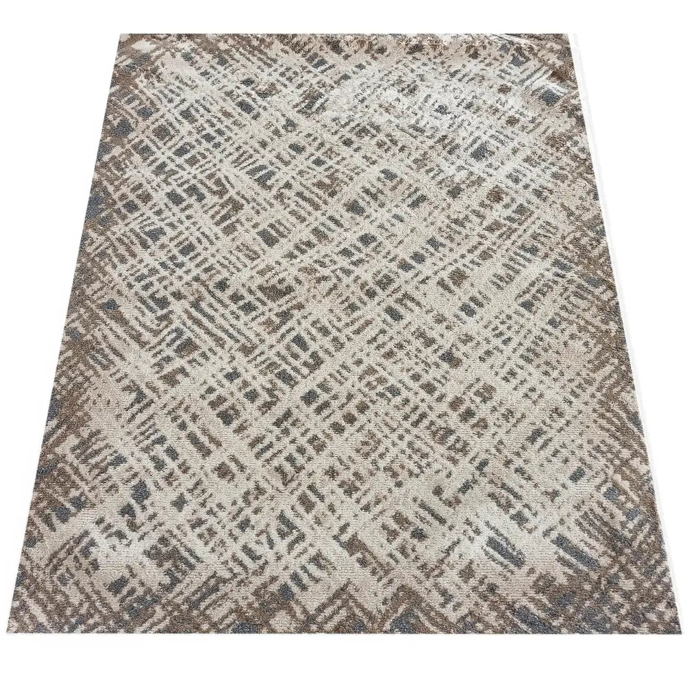 Tepe Roxanne teppe 200 x 290 cm, sett ovenfra med abstrakt rutemønster i beige og brune nyanser, moderne tekstur.