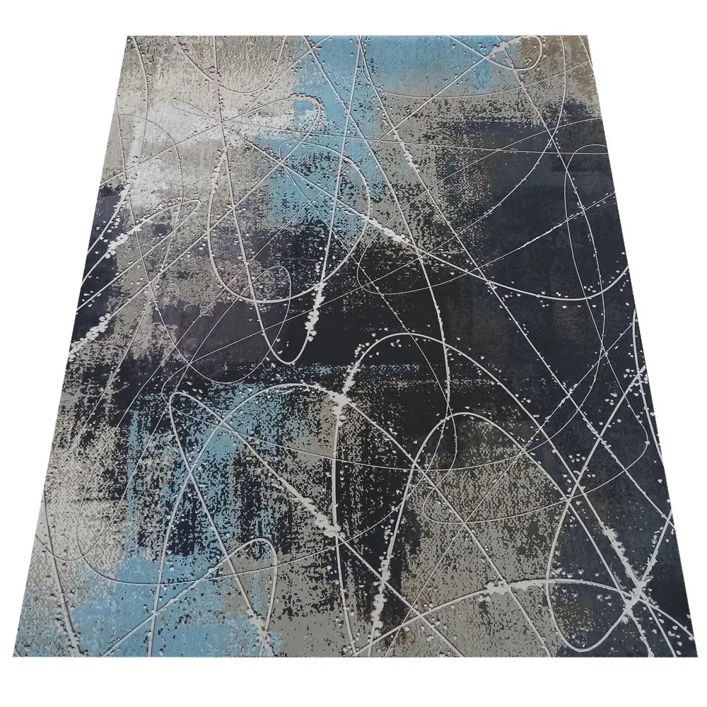 Tepe Teppihoreca-Ny teppe 120 x 180 cm, skråvisning av grått, blått og sort abstrakt mønster med hvite linjer.