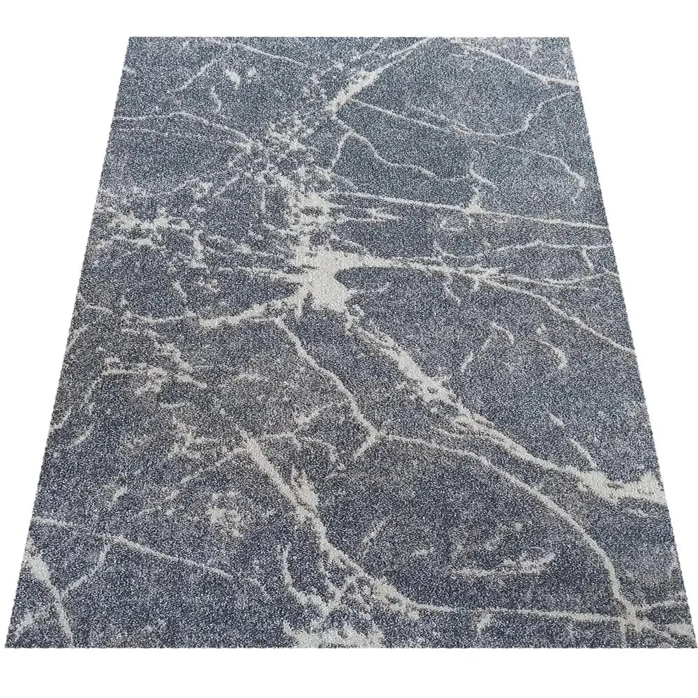 Tepe Vista 07 grå teppe 120 x 170 cm med marmorlignende lysegrå mønster sett ovenfra.