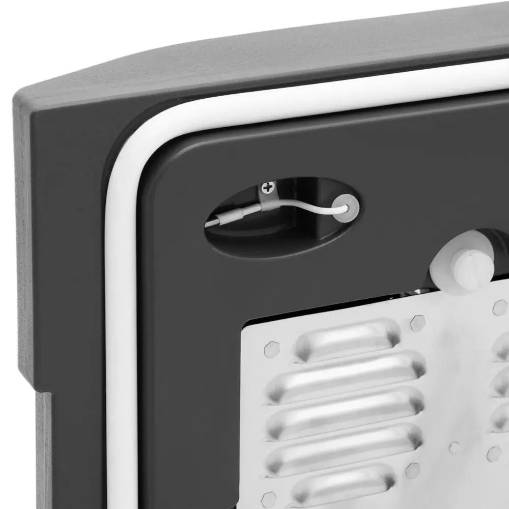 Termosbeholder med termoisolering, nærbilde av skrukobling, ledning og hvit gummiert kant i monteringsdetalj.