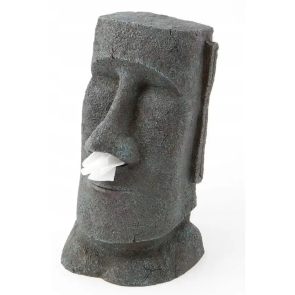 Tissueboks dispenser utformet som grå Moai-statue, papirlommetørkle synlig i nesen.