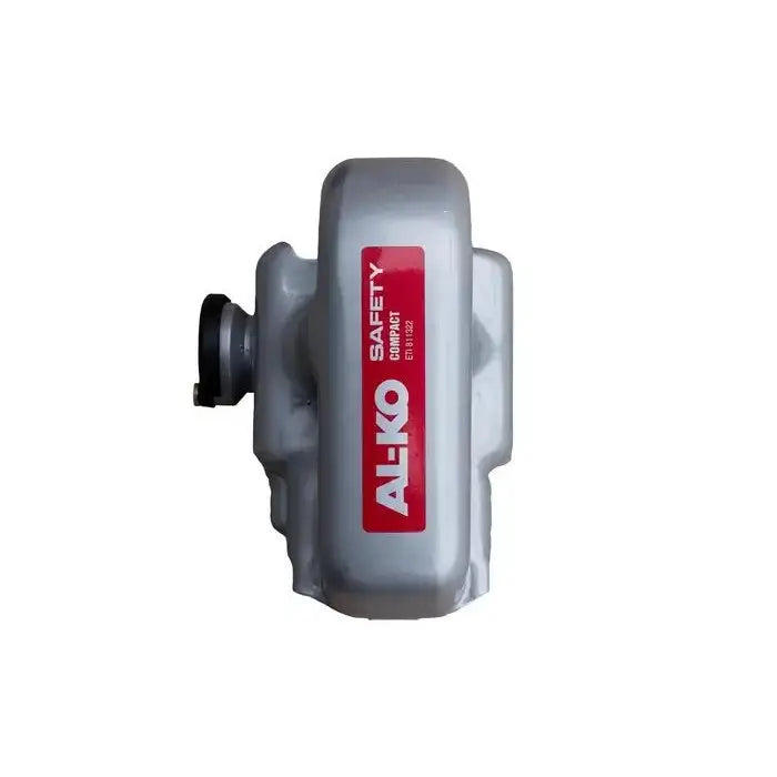 Trekkbeskyttelse AL-KO Safety Compact, sett ovenfra med rød etikett og tydelig sylinderformet tilkobling til venstre.