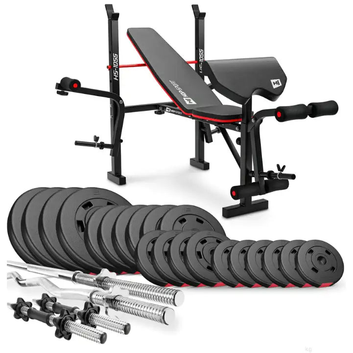 Treningsbenk med vektstangsett, skrå rygg og beinruller, vektplater og manualstenger foran benken.